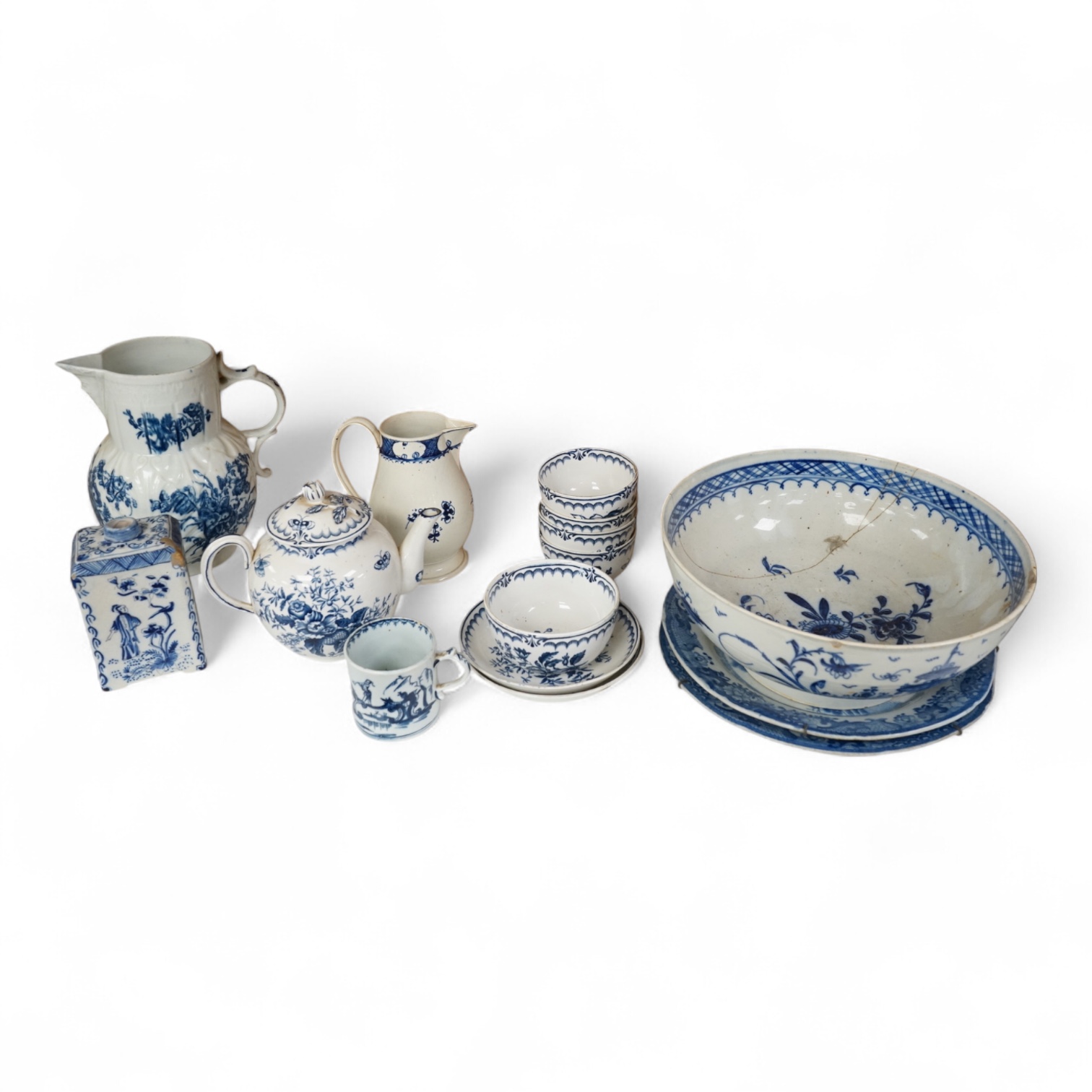 An 18th century blue and white Worcester jug and assorted Booths Worcester style tea wares, largest 24cm high